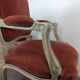 Paire de fauteuils cabriolets rouges de style Louis XV