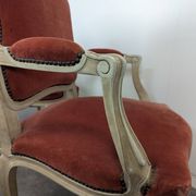 Pair of red cabriolet armchairs in Louis XV style