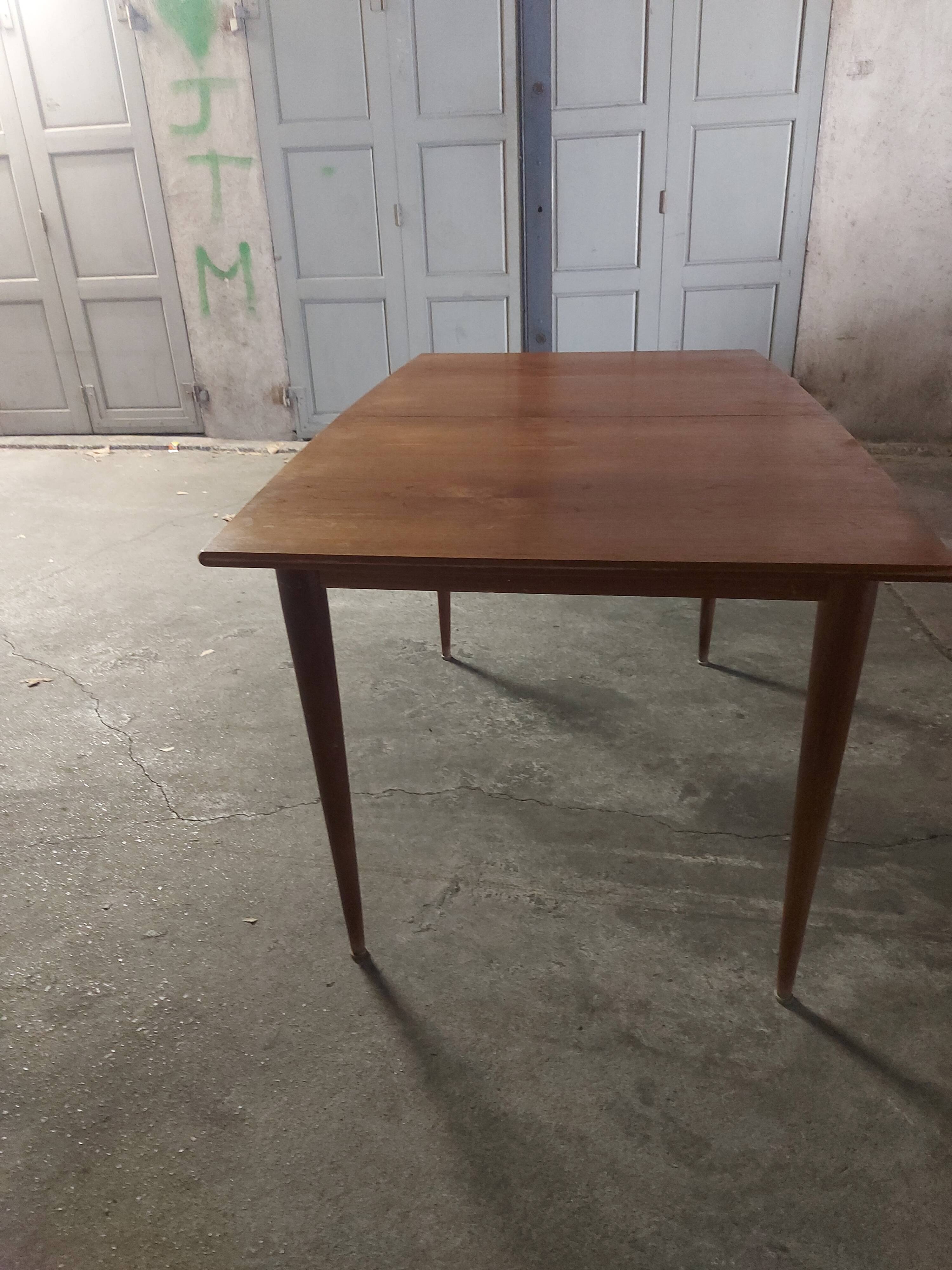 Scandinavian teak table with built-in extension