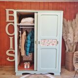 Wardrobe in old wood, renovated and restyled in celadon green