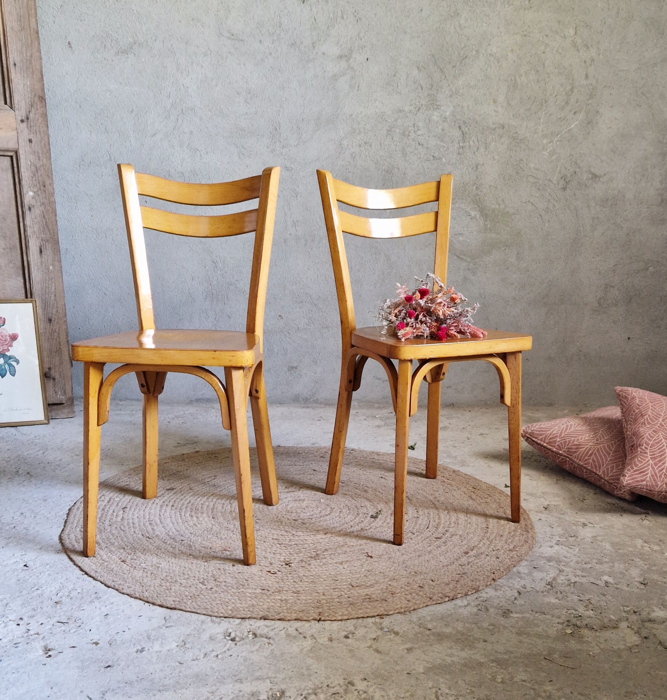 Old and pretty pair of Baumann bistro chairs