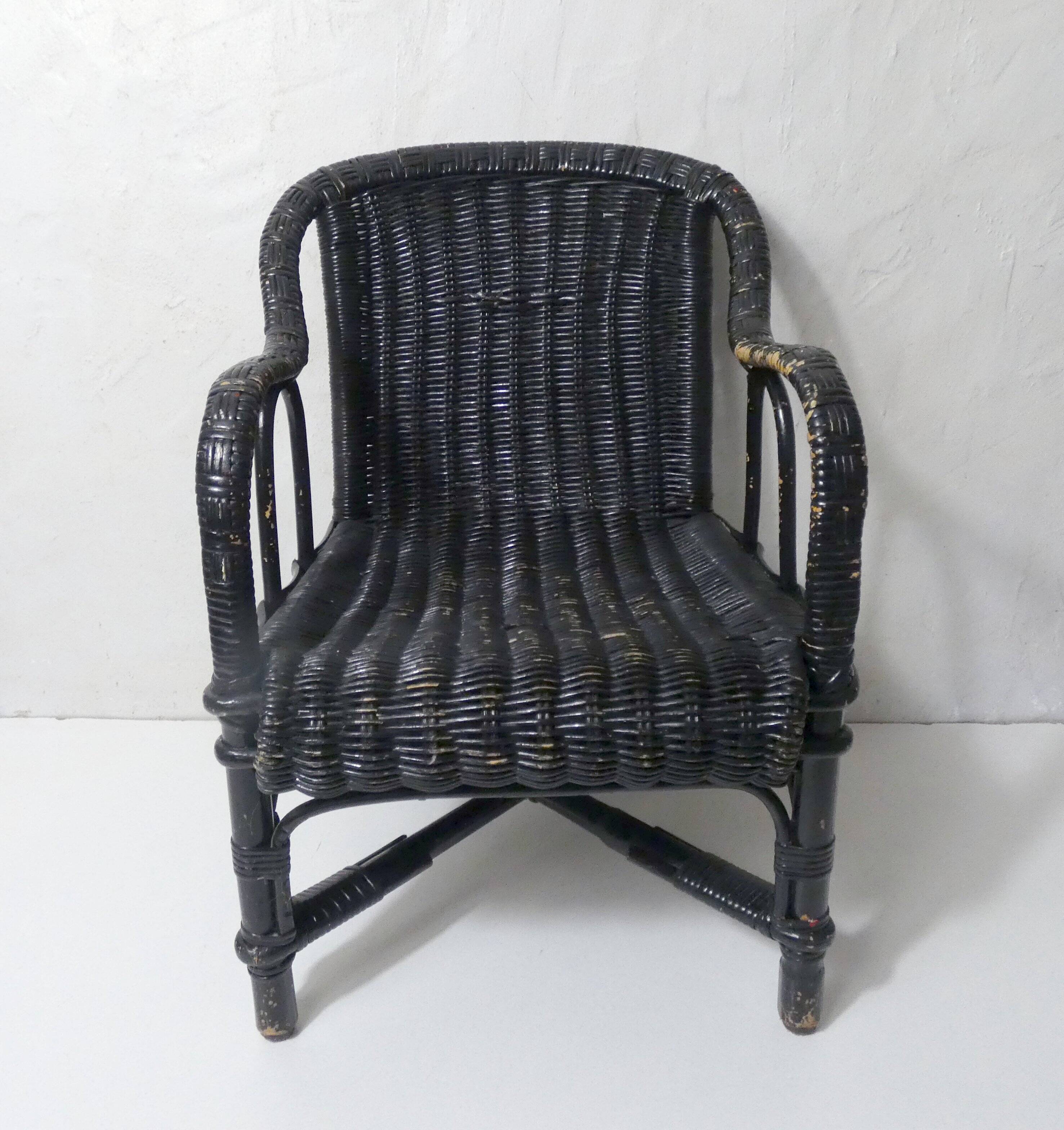 Vintage children's size rattan armchair