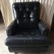 Former black leather chair