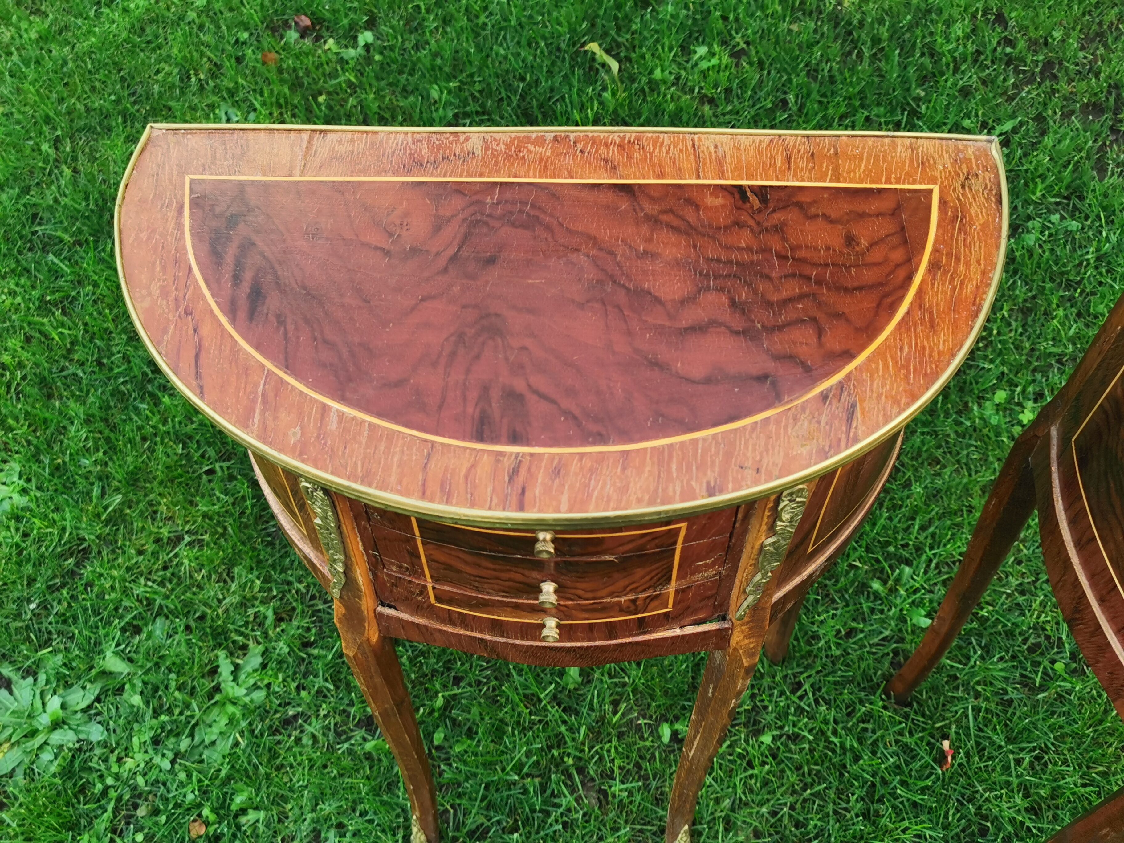 half-moon bedside pair in marquetry, bronze ornaments