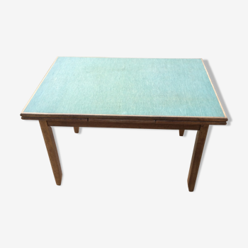 Table en bois massif et skaï vert