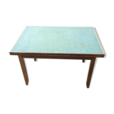 Table en bois massif et skaï vert