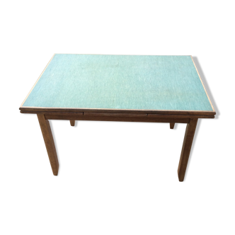 Table en bois massif et skaï vert