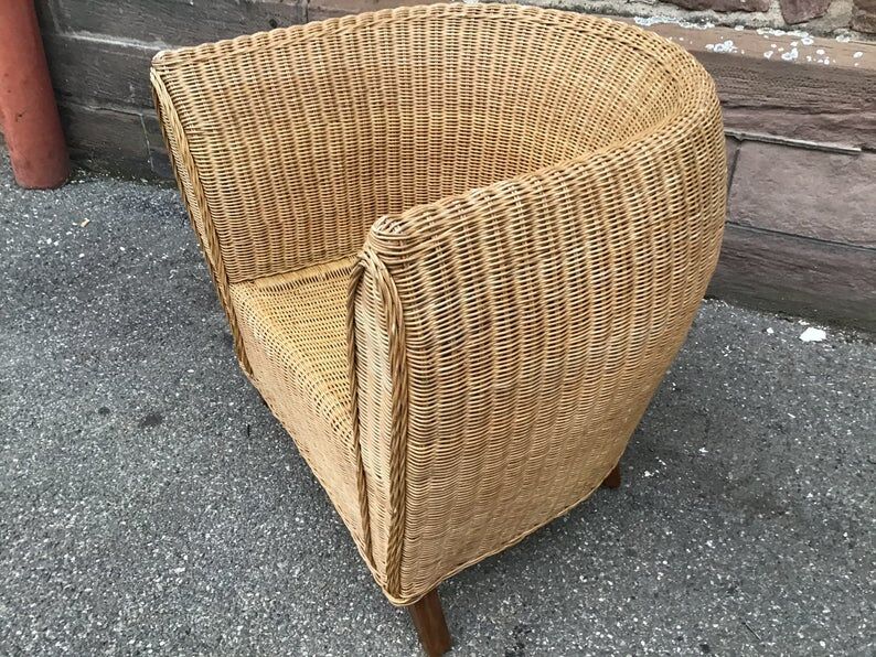 Vintage gondola chair in rattan