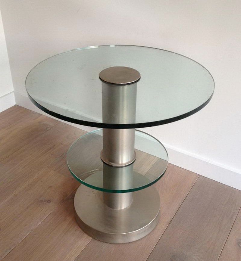 Brushed metal pedestal table and glass slabs