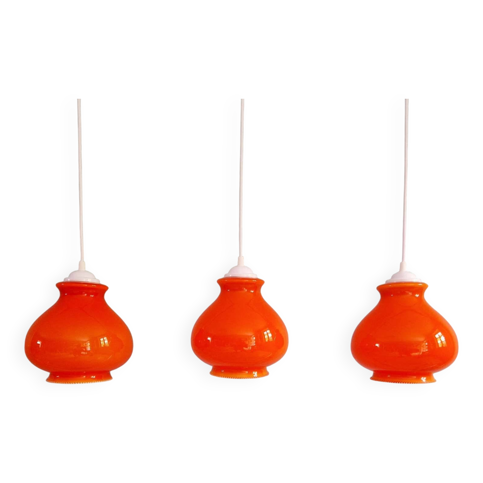 Trio of vintage orange opaline pendant lights, 1960-70