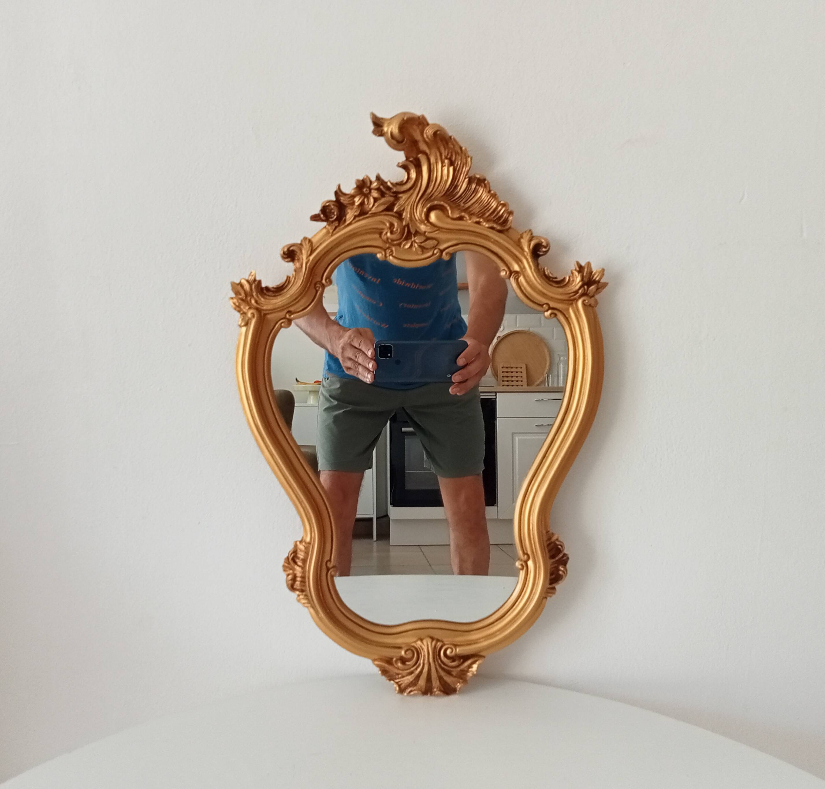 Vintage rococo mirror in gilded resin