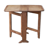 Old wooden table with double swings