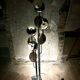 "Four heads" floor lamp by Goffredo Reggiani