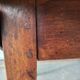 Antique round farmhouse table with drop-leaf doors in solid pegged wood