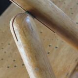 Pair of vintage wooden folding chairs with star pattern on seat