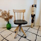 Black and wood workshop chair with metal base