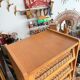 Vintage 1960s chest of drawers / chiffonnier with tapered legs and rattan.
