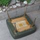 Stool footrest in green skaï