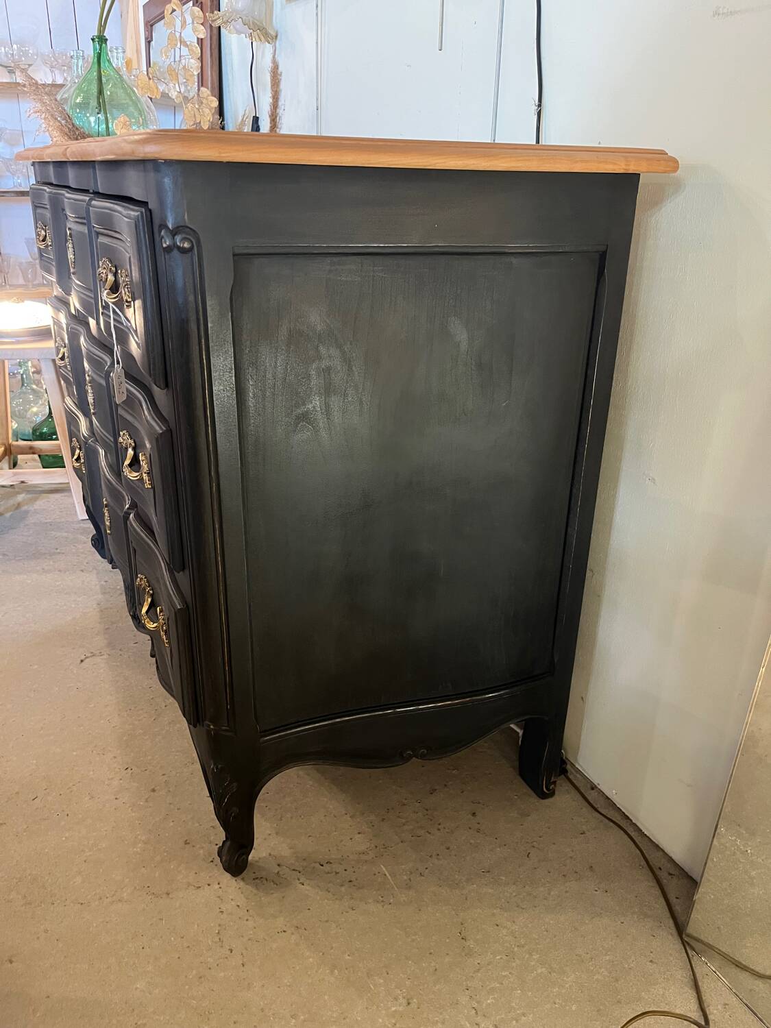Black and wood chest of drawers
