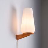 Wall lamp with opal glass shade on wooden base by Philips