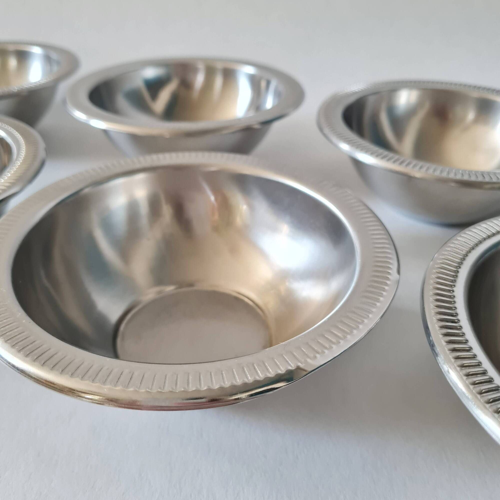Set of 6 small vintage stainless steel bowls.
