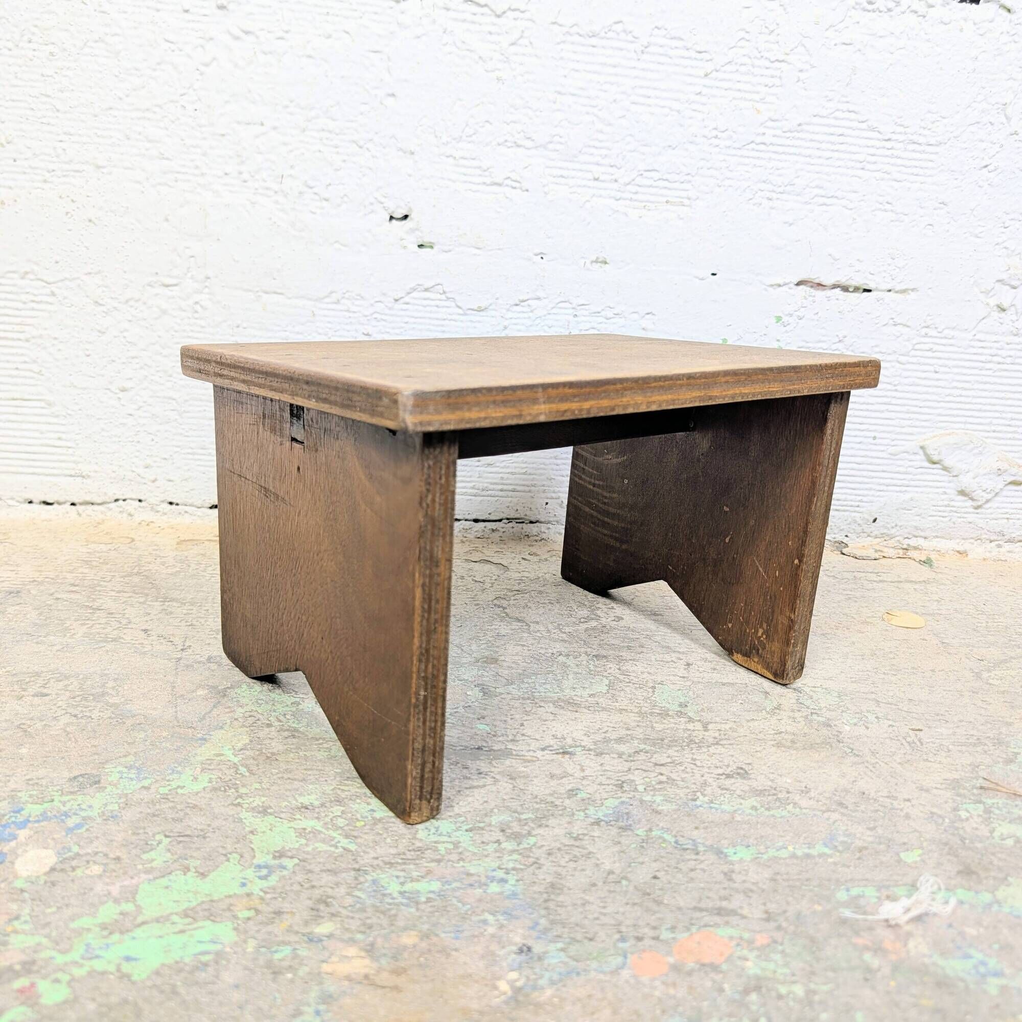 Small patinated wooden footrest bench