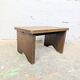 Small patinated wooden footrest bench