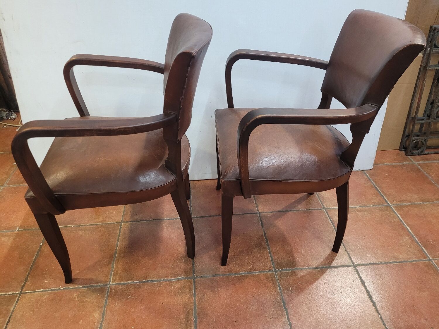 Pair of antique leather bridge armchairs