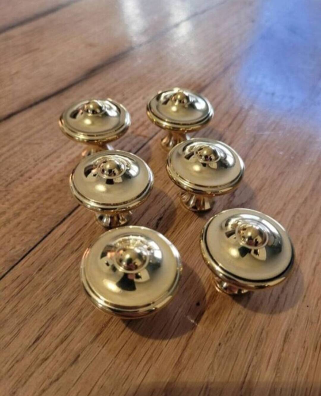 6 polished brass furniture knobs