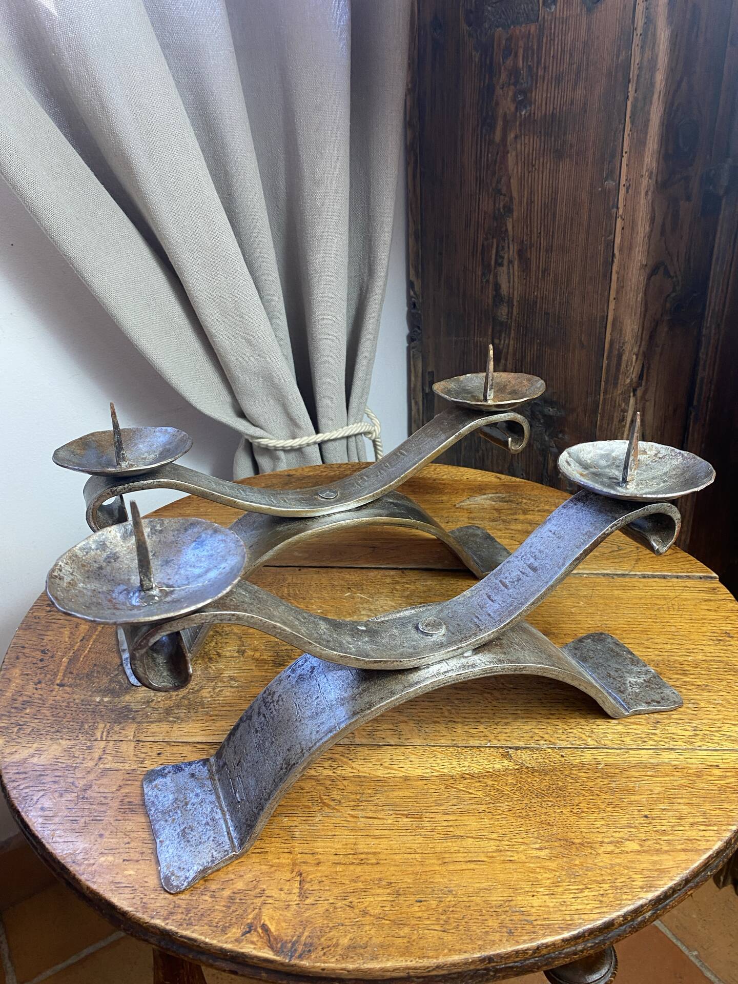 Brutalist wrought iron candlestick pair
