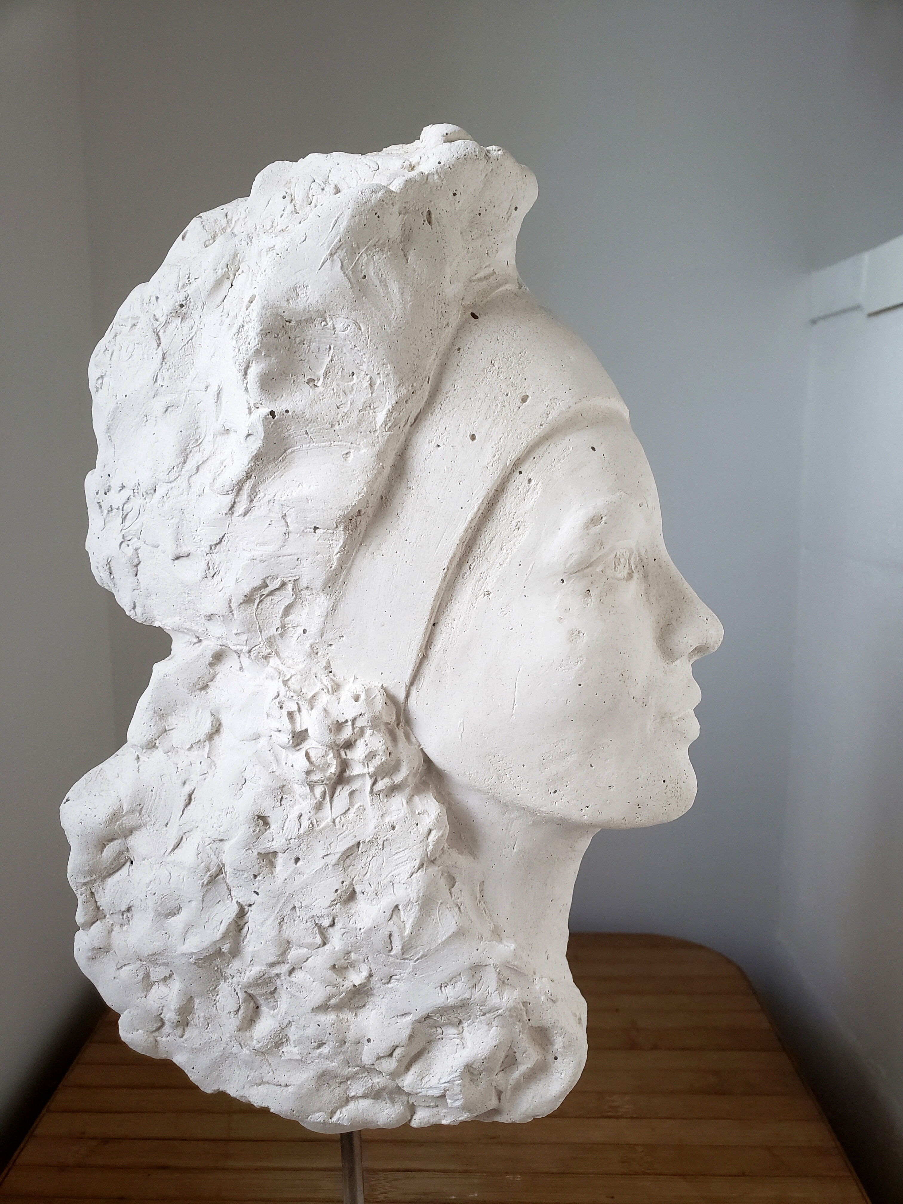 Young woman's head in plaster