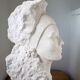 Young woman's head in plaster
