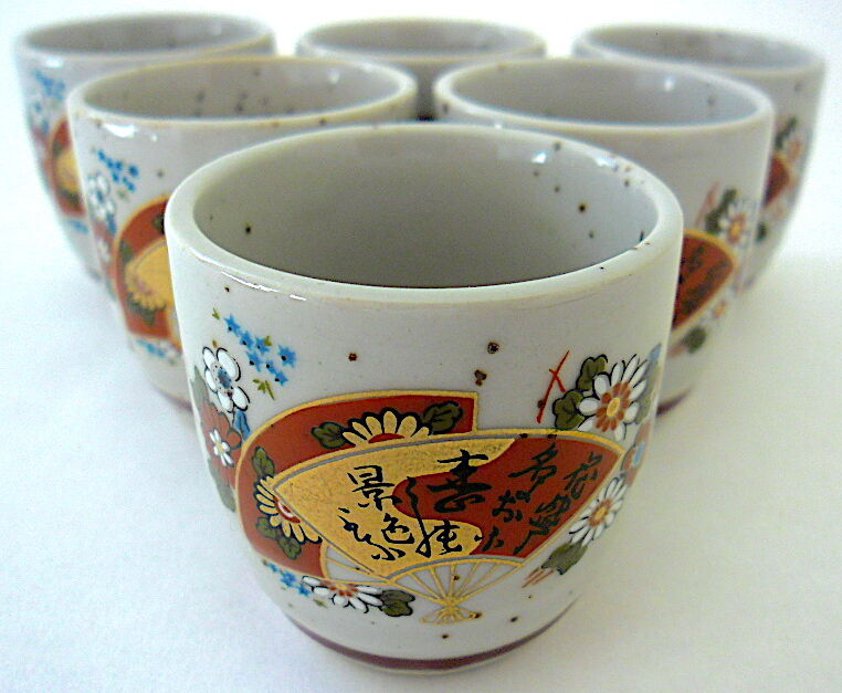 Far Eastern porcelain sake service consisting of a carafon and six cups