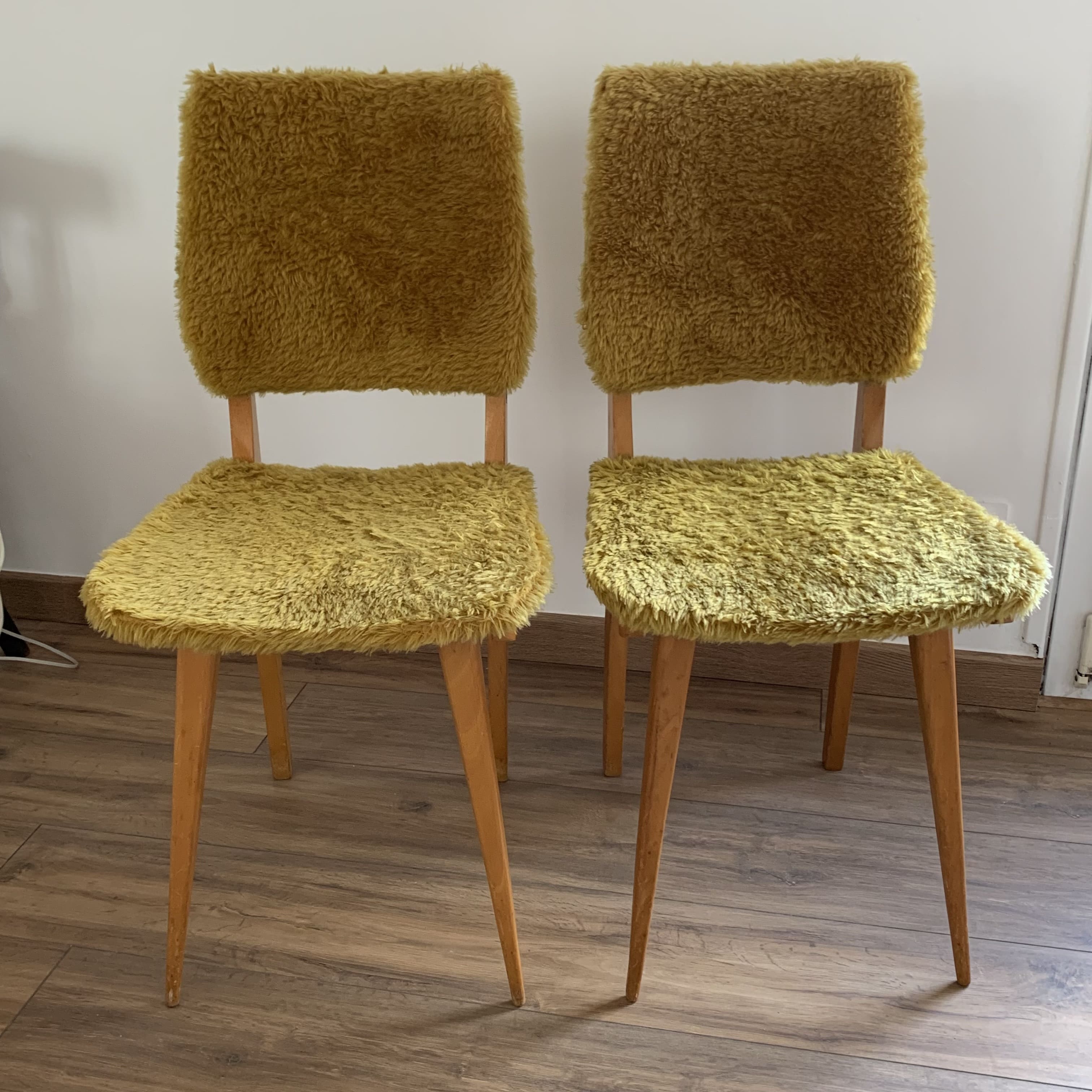 2 yellow moumoute chairs