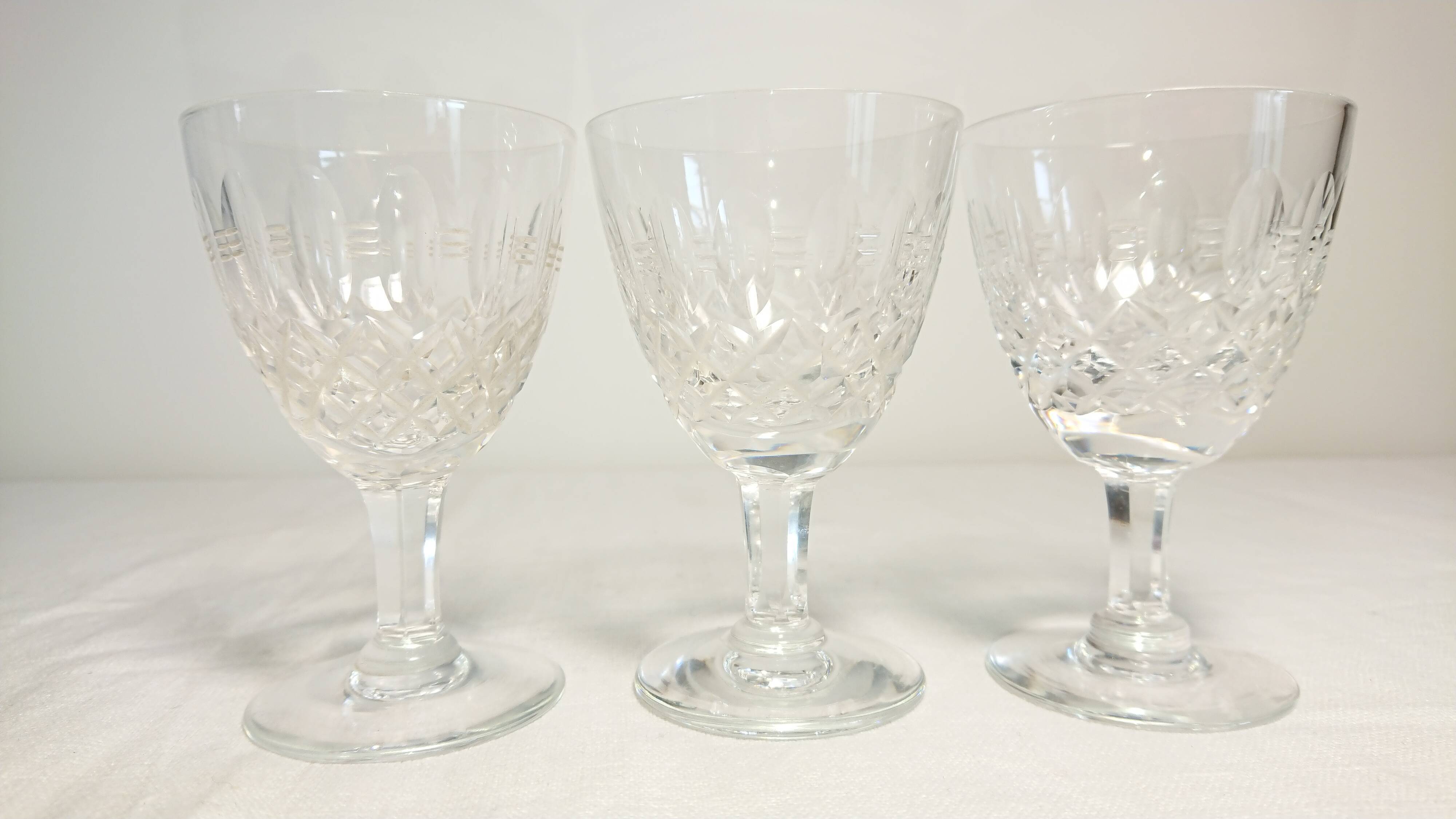 Three facet-cut glasses from the Lorraine crystalware.