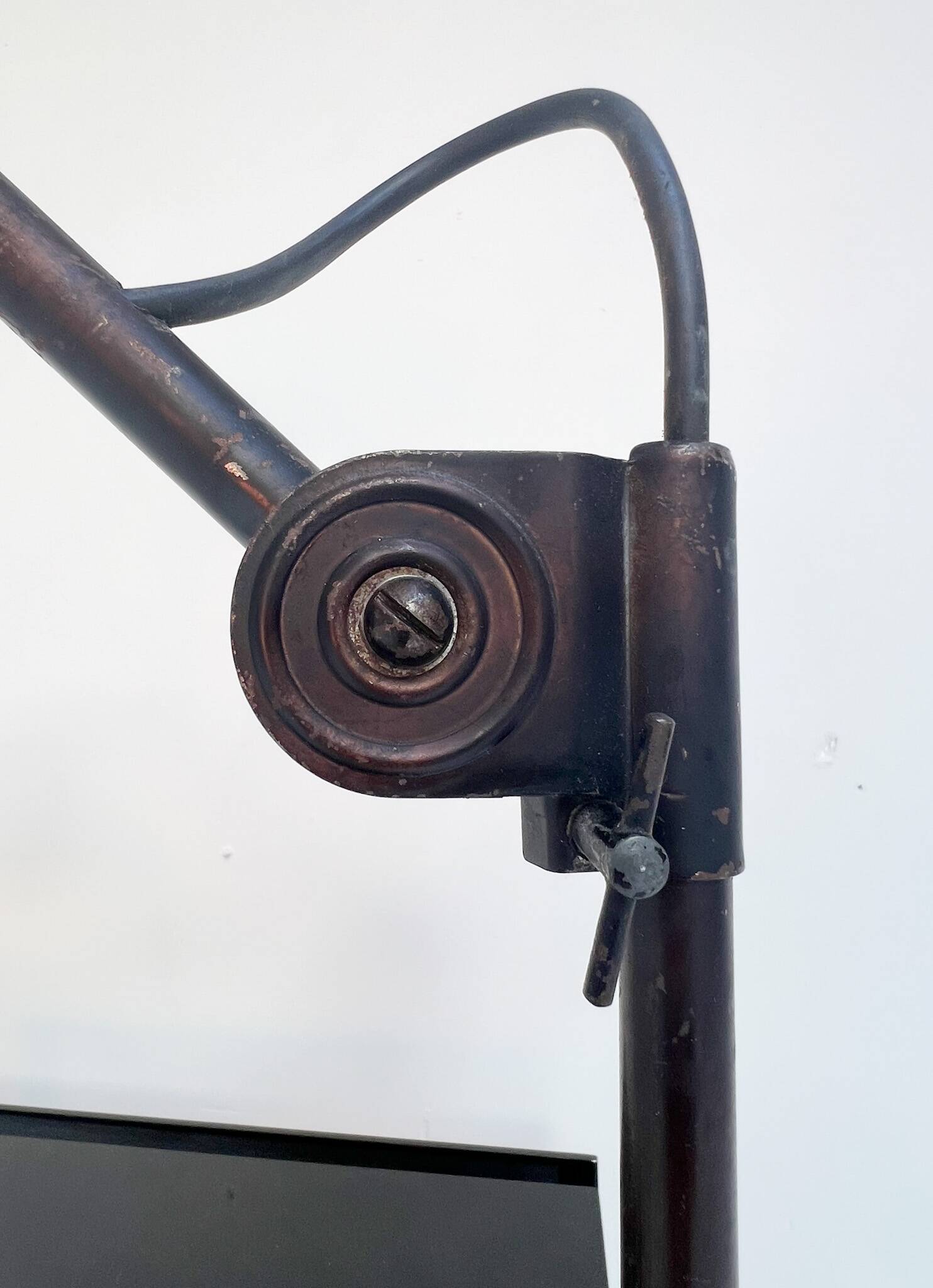 Industrial in height to be adjusted vintage clamp lamp from the 1970s