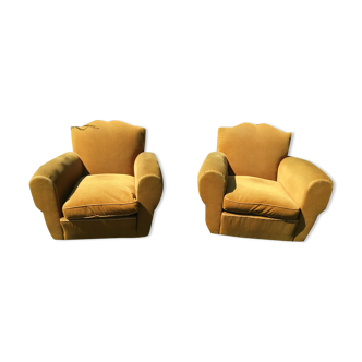 2 moustache club chairs