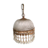 Hanging glass and stamps