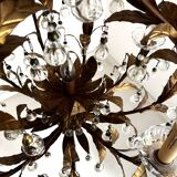 Chandelier with tassels and golden brass