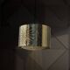 Hammered copper metal pendant light with a golden cylindrical shade.