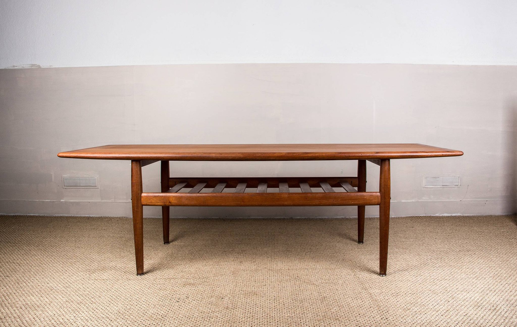 Large Danish teak coffee table, two levels, by Grete Jalk for Glostrup Mobelfabrik.