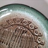 Signed stoneware bowl from Puisaye, relief decoration.