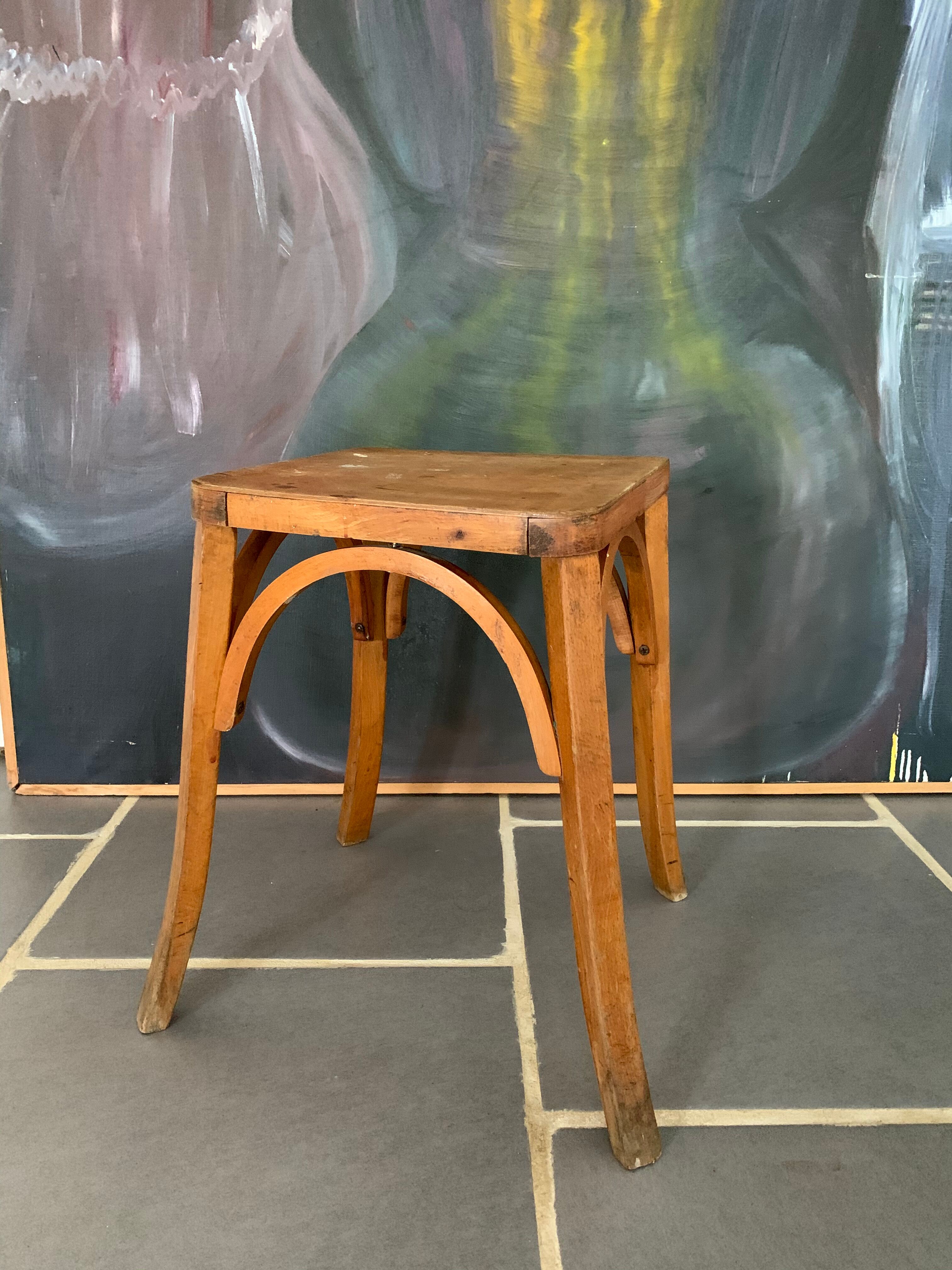 Vintage curved wooden stool