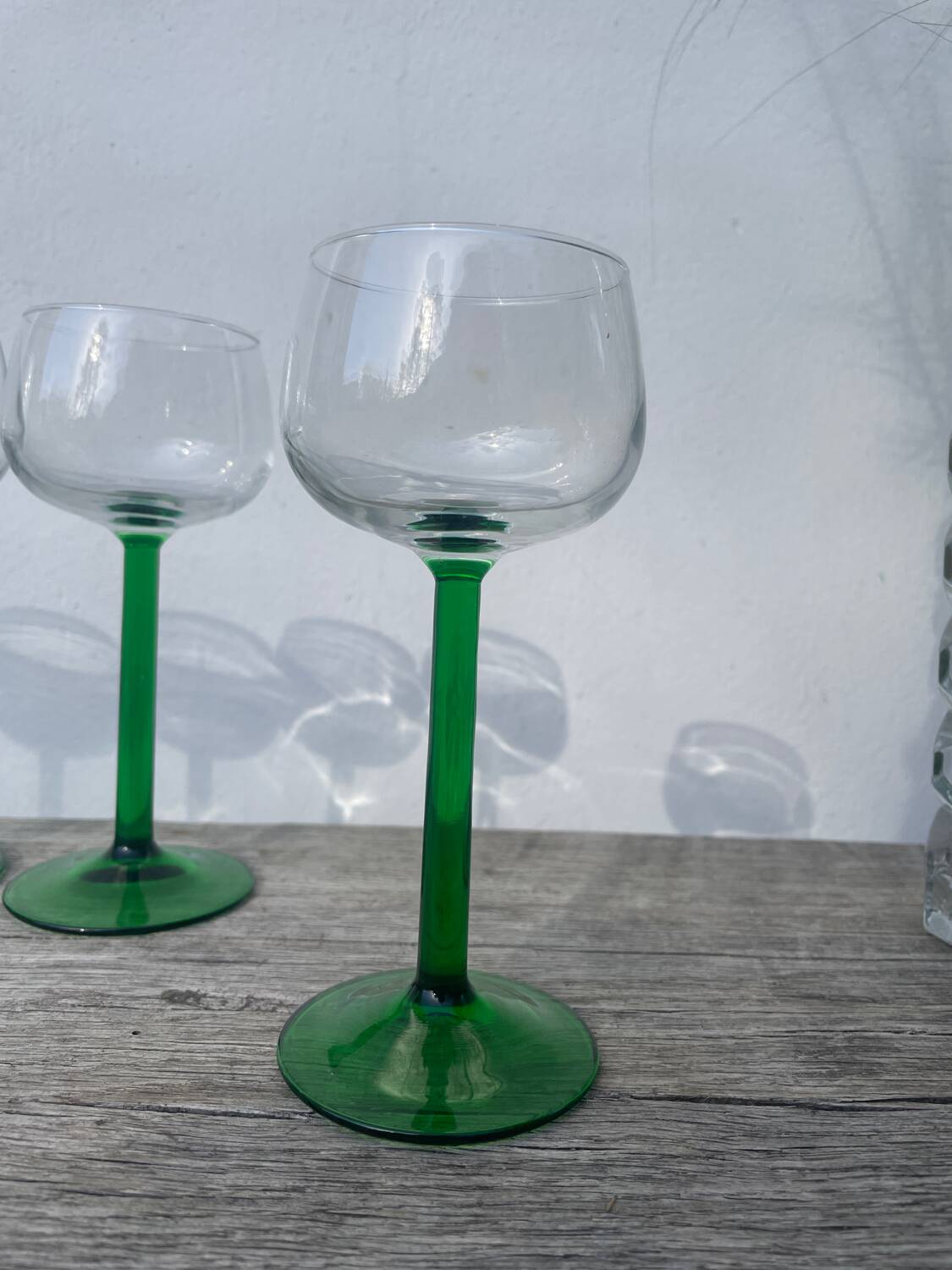7 green glass stemmed glasses