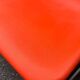 Set of 4 orange chairs designed by Robin Day for Hille.