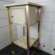 Bedside table in patinated iron, brass and marble tops