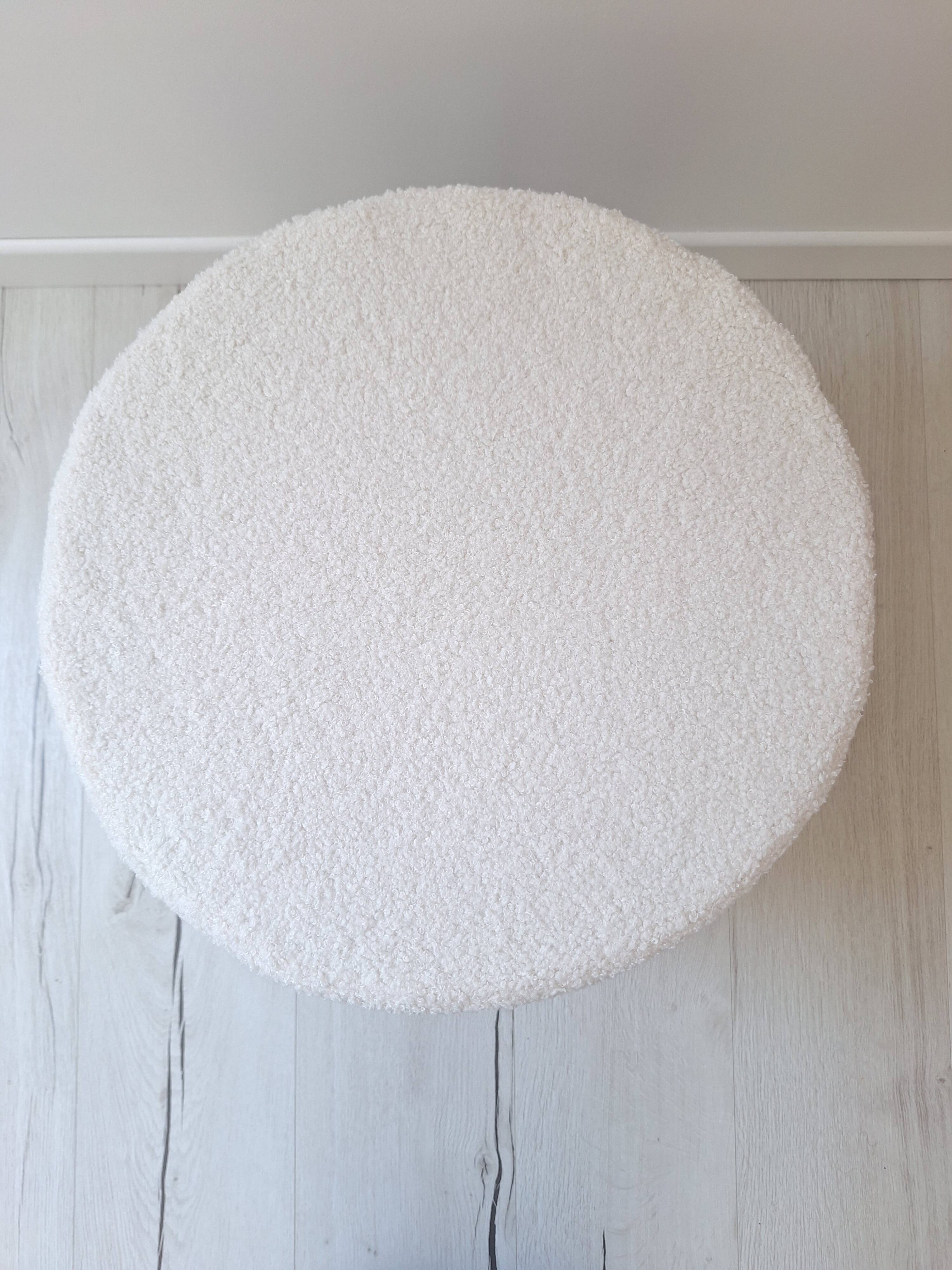 Rattan and terry fabric pouf