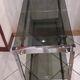 Vintage console in smoked glass and chrome metal
