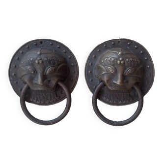 Pair of Asian bronze door knockers