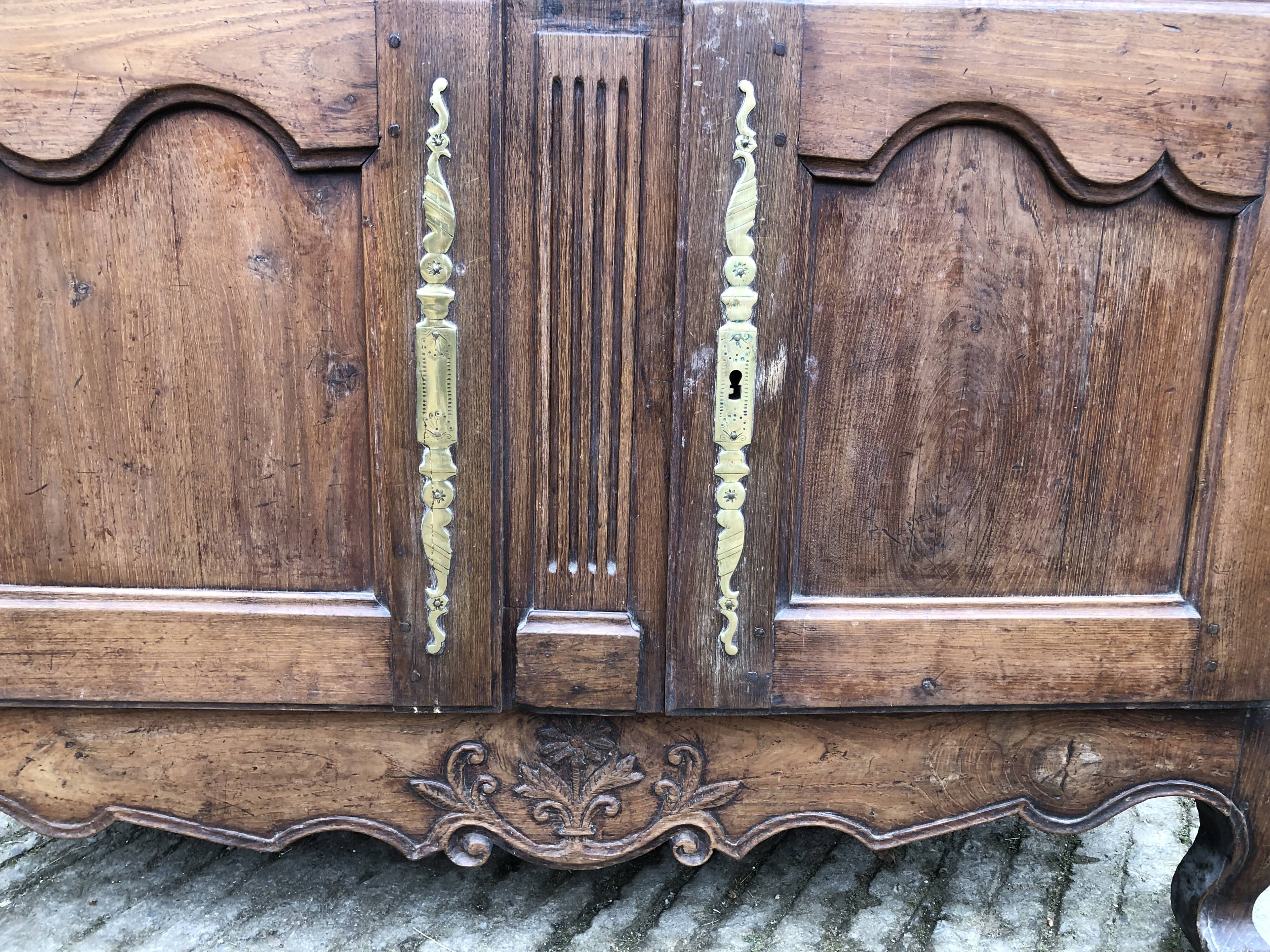 Antique Louis XV low chestnut sideboard with 2 doors and 1 drawer.